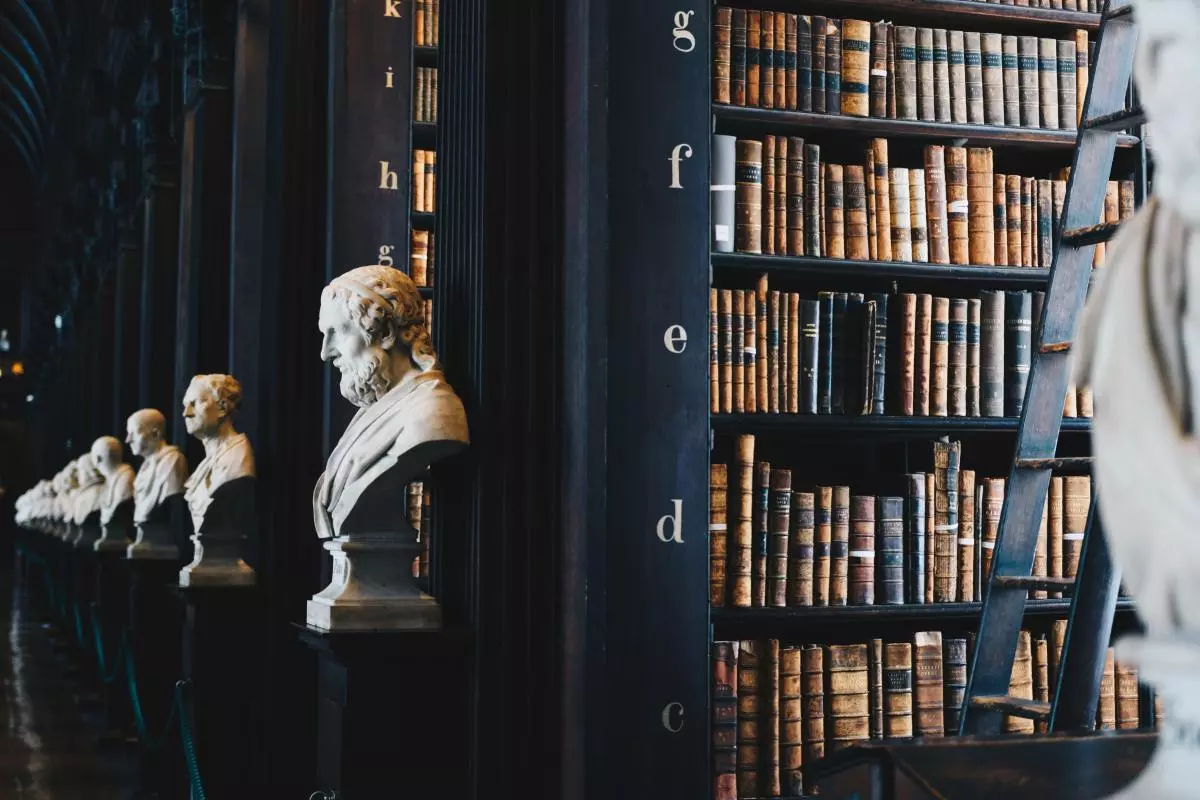 Bookshelves and philosopher statues
